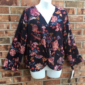 Floral infinity knot top